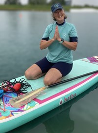 Angela On Board Namaste Blurred Background